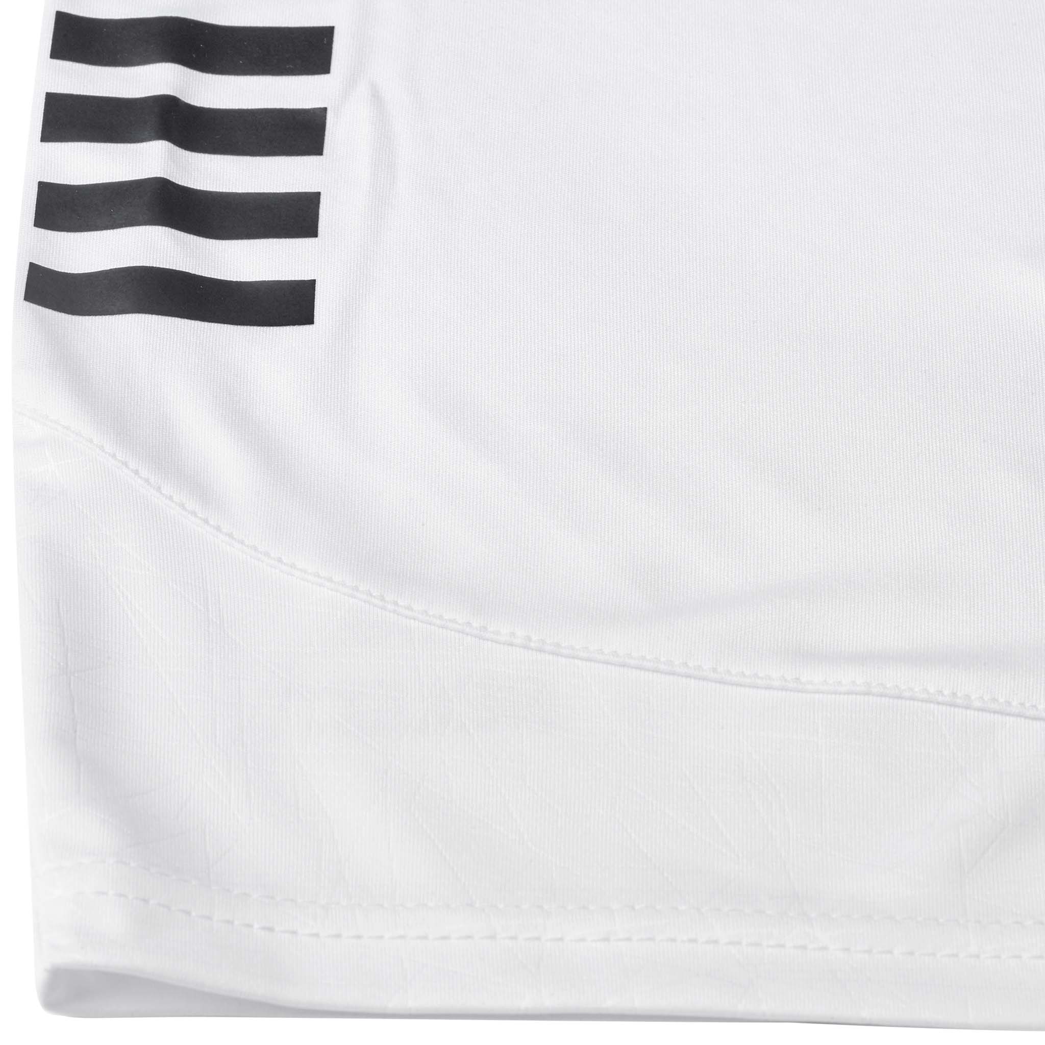Närbild av vita Player shorts Spain v25, Match & Training wear, med svart randdetalj och fåll.