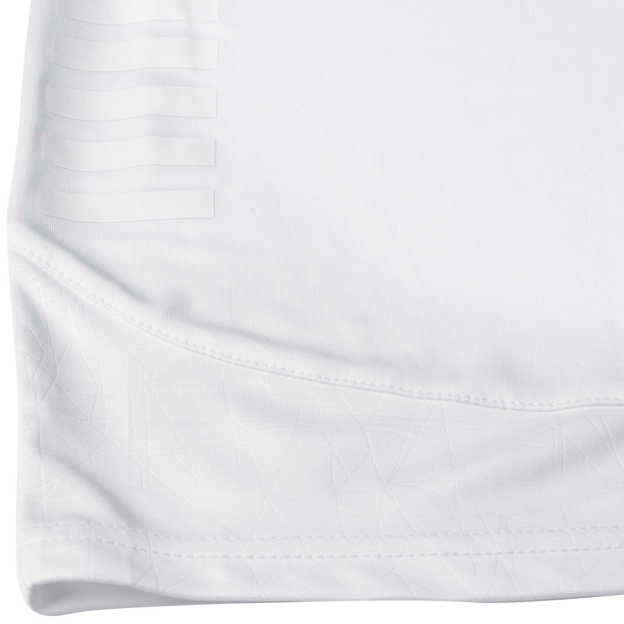 Närbild av vita Player shorts Spain v25, Match & Training wear, som visar tygstruktur och sydd fållkant.