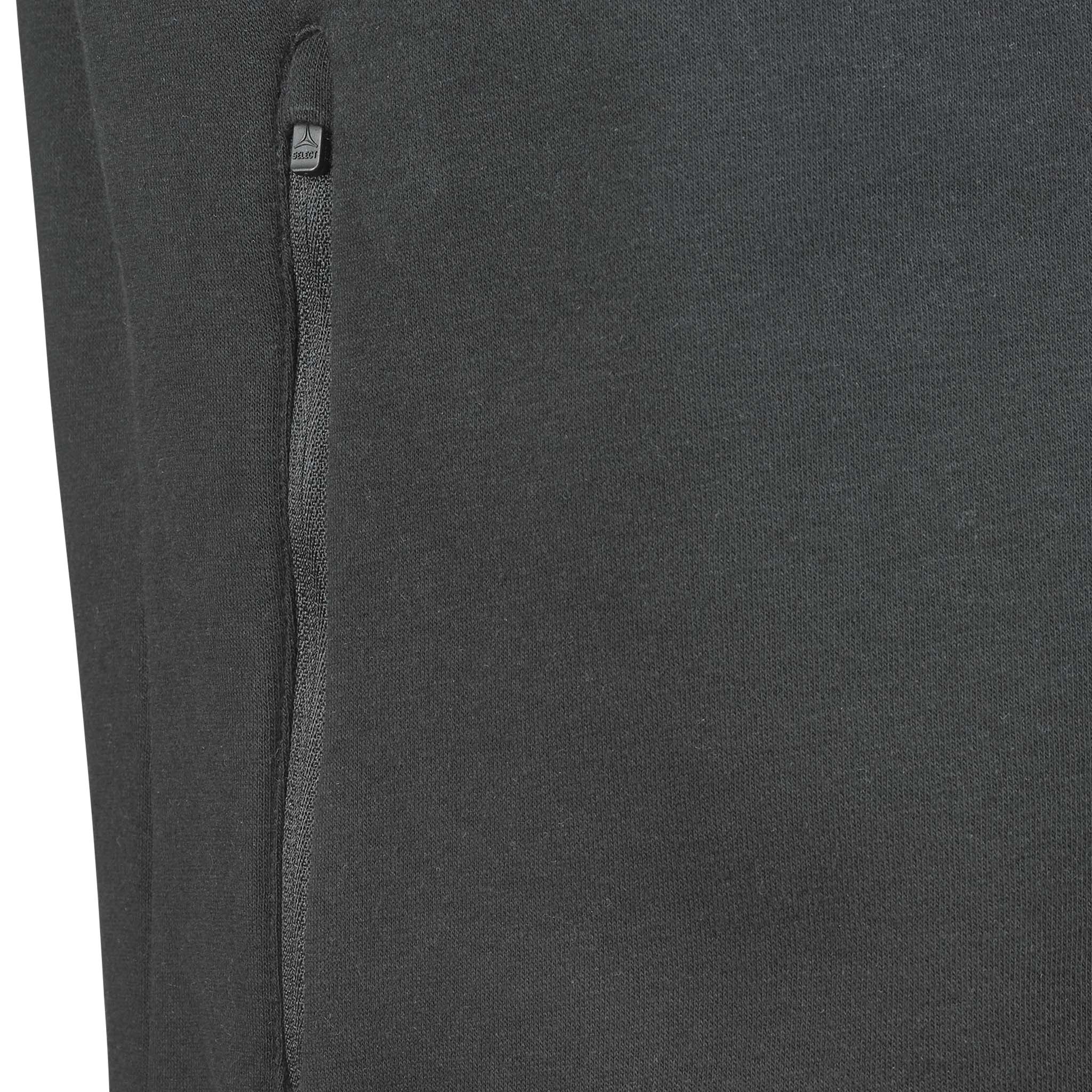Närbild av svart Zip jacket Oxford v25 fritidskläder med dragkedjeficka och mörkgrå tygstruktur.