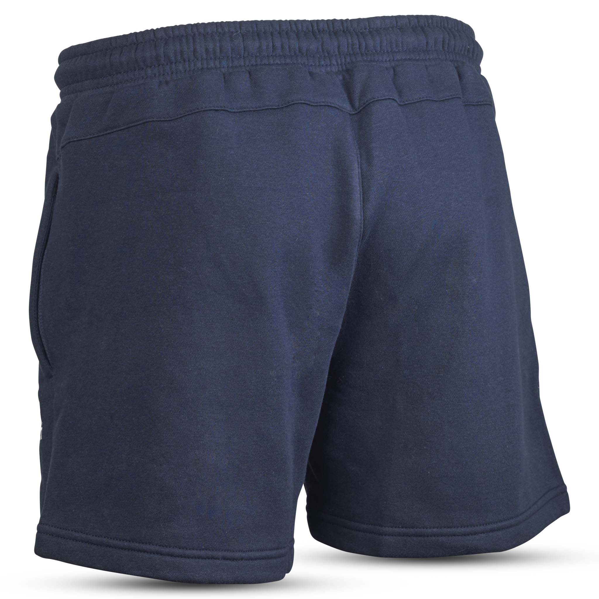 Marinblå Sweat shorts Oxford women v25, fritidskläder, sedd bakifrån med resår i midjan.