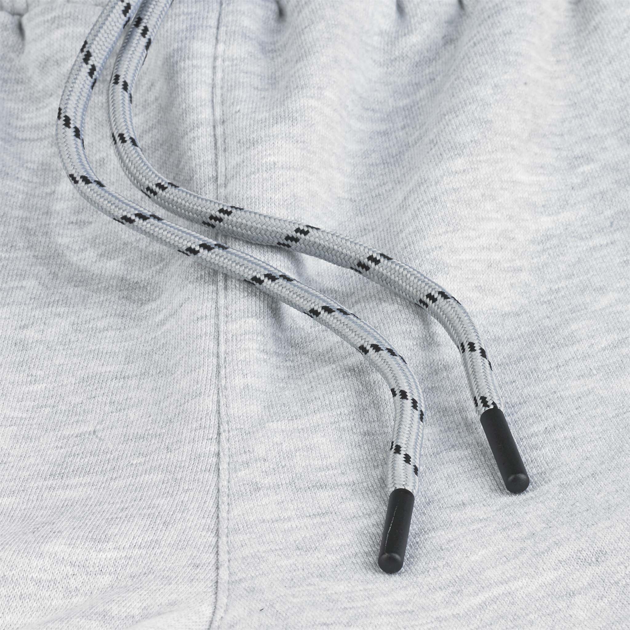 Närbild av grå Sweat shorts Oxford women v25 fritidskläder med dragsko och svarta spetsar.